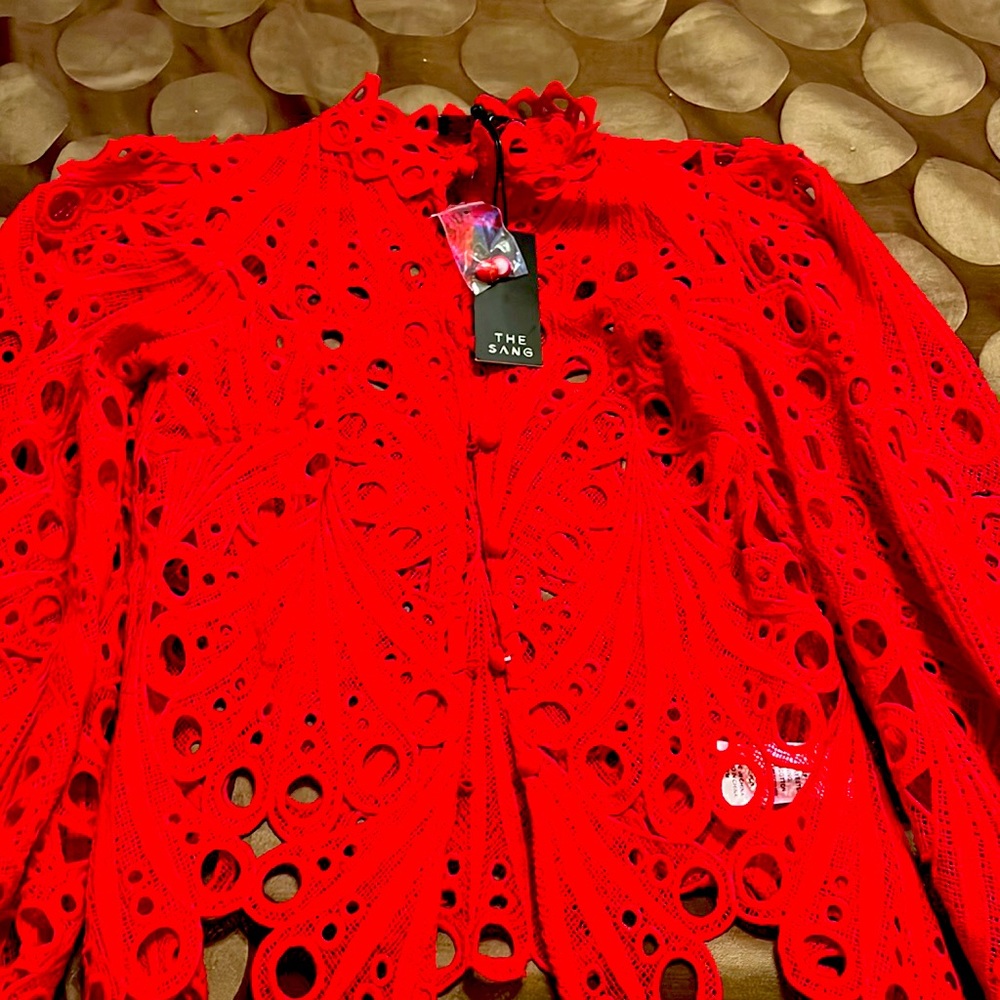 Photos do no justice beautiful red top, never worn.